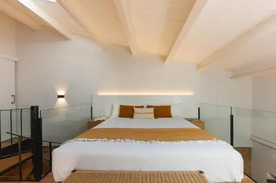 Cama o camas de una habitación en Bravissimo Ballesteries 40, Barri Vell duplex