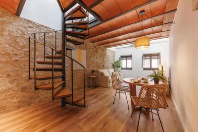 Zona de estar de Bravissimo Ballesteries 40, Barri Vell duplex
