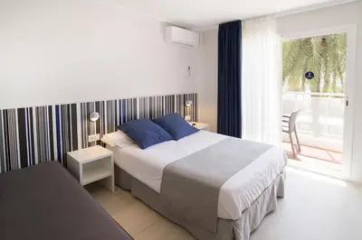 Cama o camas de una habitación en Ibersol Sorra d'Or
