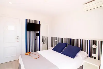 Cama o camas de una habitación en Ibersol Sorra d'Or