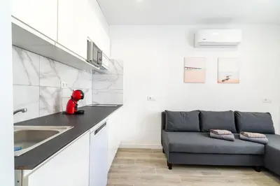 Una cocina o zona de cocina en Salatan Apartments, Plaza Paris