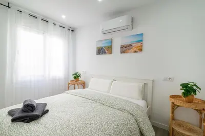 Cama o camas de una habitación en Salatan Apartments, Plaza Paris