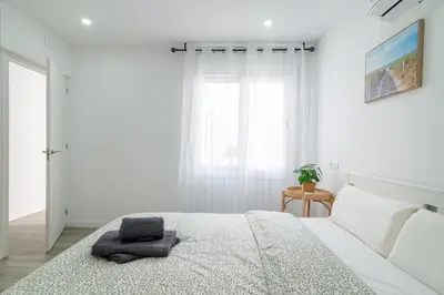 Cama o camas de una habitación en Salatan Apartments, Plaza Paris