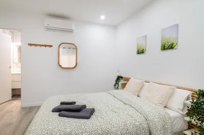 Cama o camas de una habitación en Salatan Apartments, Plaza Paris