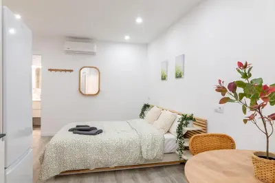 Cama o camas de una habitación en Salatan Apartments, Plaza Paris