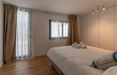 Cama o camas de una habitación en Apartamentos Vista Bella Tamariu