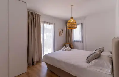 Cama o camas de una habitación en Apartamentos Vista Bella Tamariu