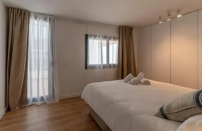 Cama o camas de una habitación en Apartamentos Vista Bella Tamariu