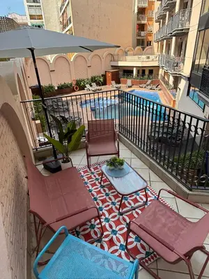 Un balcón o terraza de Casa Tita - Exclusivo Apartamento con Gran Terraza y Vistas a la Piscina en Lloret de Mar