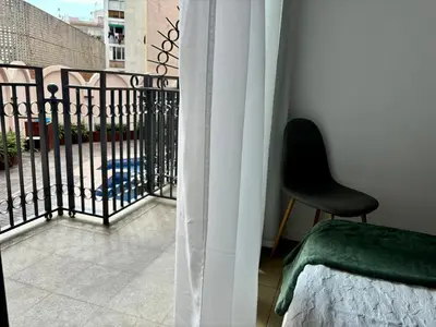 Un balcón o terraza de Casa Tita - Exclusivo Apartamento con Gran Terraza y Vistas a la Piscina en Lloret de Mar