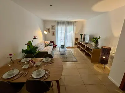 Zona de estar de Casa Tita - Exclusivo Apartamento con Gran Terraza y Vistas a la Piscina en Lloret de Mar