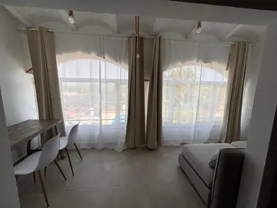 Zona de estar de Casa con vistas y piscina en Masos de Pals