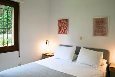 Cama o camas de una habitación en Casa con vistas y piscina en Masos de Pals