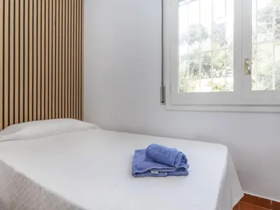 Cama o camas de una habitación en Apartment AirMenuda by Interhome
