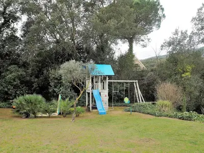 Zona de juegos infantil en Villa in Calonge with Pool near Beach