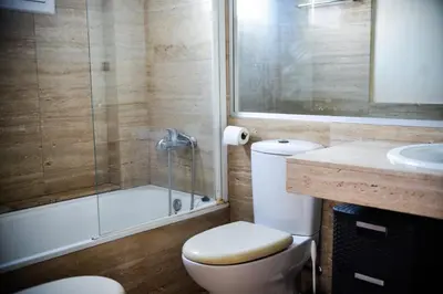 Un baño de Beachfront Apartment with Pool and Garden S Abanell Blanes