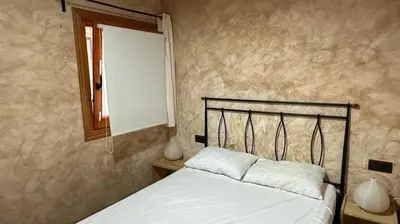Cama o camas de una habitación en Apartament rústic