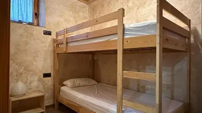 Cama o camas de una habitación en Apartament rústic