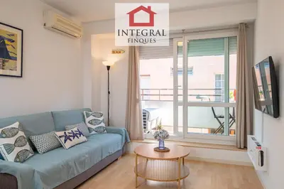 Zona de estar de Apartament la Illeta