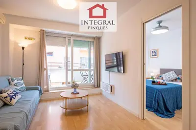 Una televisión o centro de entretenimiento en Apartament la Illeta