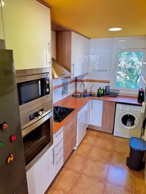 Una cocina o zona de cocina en Apartamento Canet de Mar - Primera linea de Playa - Increibles vistas al Mar
