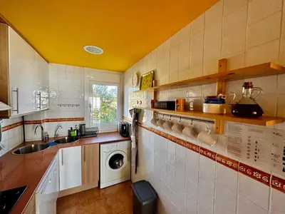 Una cocina o zona de cocina en Apartamento Canet de Mar - Primera linea de Playa - Increibles vistas al Mar