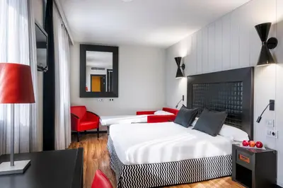 Cama o camas de una habitación en Salles Hotel Aeroport de Girona