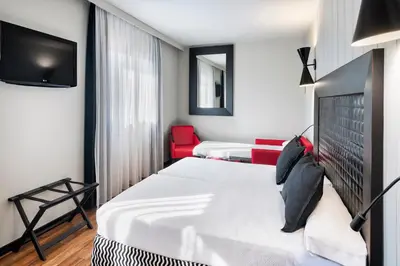 Cama o camas de una habitación en Salles Hotel Aeroport de Girona