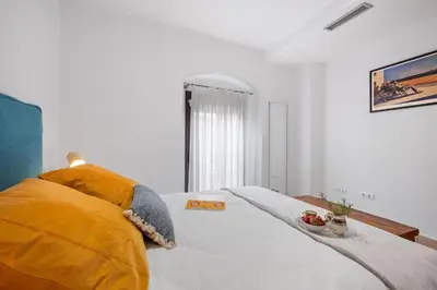 Cama o camas de una habitación en Labarbara Palamós Apartament