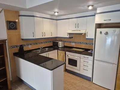 Una cocina o zona de cocina en Bravaholidays-202, Centro, AA, Wifi