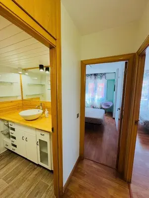 Cama o camas de una habitación en Piso Shic de playa Fenals con terraza y piscina