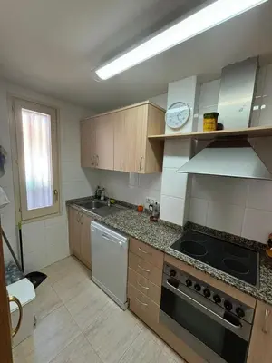 Una cocina o zona de cocina en Amplio apartamento de 2 dormitorios en el casco antiguo de Tossa
