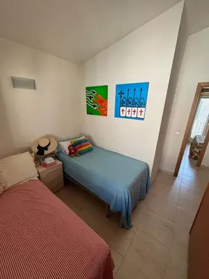 Cama o camas de una habitación en Amplio apartamento de 2 dormitorios en el casco antiguo de Tossa