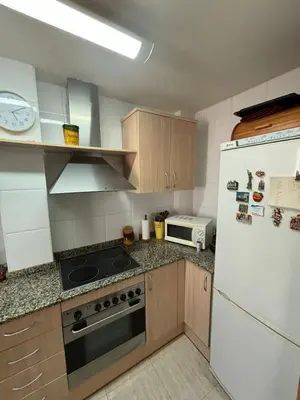 Una cocina o zona de cocina en Amplio apartamento de 2 dormitorios en el casco antiguo de Tossa