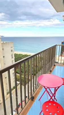 Un balcón o terraza de Bright Apartment with Two Balconies and a Seaside Pool