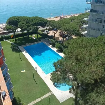 Bright Apartment with Two Balconies and a Seaside Pool