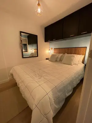 Cama o camas de una habitación en Hauzify I Apartament Mar d'Aro