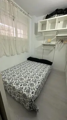 Cama o camas de una habitación en Blanes a pie de playa s'abanell