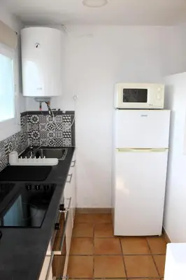 Una cocina o zona de cocina en CBA COSTA BRAVA - Kalm