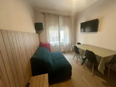 Una televisión o centro de entretenimiento en CozyCatalonia - Suite Apartment at Can Setmanes Central Blanes