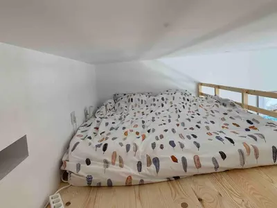 Cama o camas de una habitación en Cosy flat with terrace, swimming pool and parking in Begur