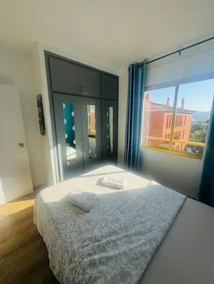 Cama o camas de una habitación en Elegante piso de sueños con piscina