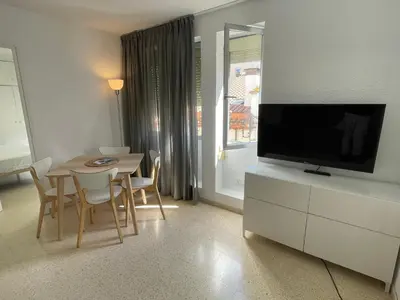 Una televisión o centro de entretenimiento en Apartament a Arenys de Mar
