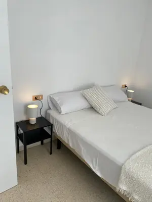 Cama o camas de una habitación en Apartament a Arenys de Mar
