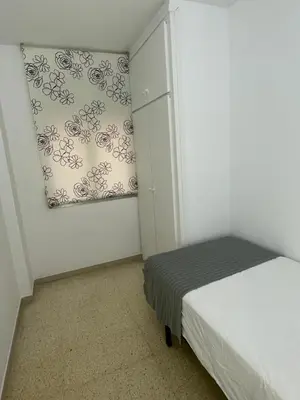 Cama o camas de una habitación en Apartament a Arenys de Mar