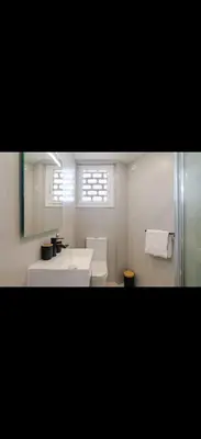 Un baño de Playa y centro comercial