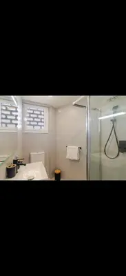 Un baño de Playa y centro comercial