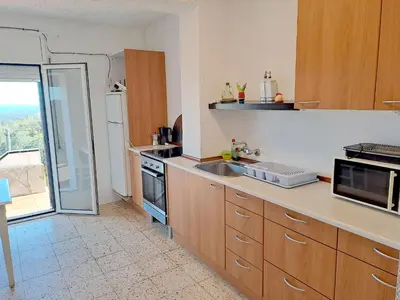 Una cocina o zona de cocina en Villa Blanca Lloret de Mar, Barbacoa, vistas al mar