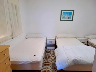 Cama o camas de una habitación en Villa Blanca Lloret de Mar, Barbacoa, vistas al mar