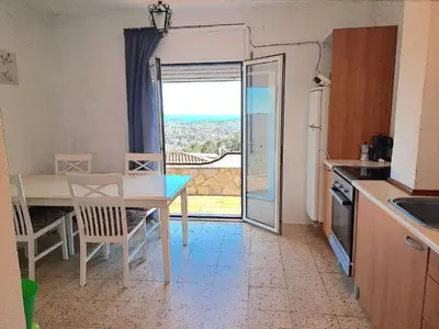 Una cocina o zona de cocina en Villa Blanca Lloret de Mar, Barbacoa, vistas al mar